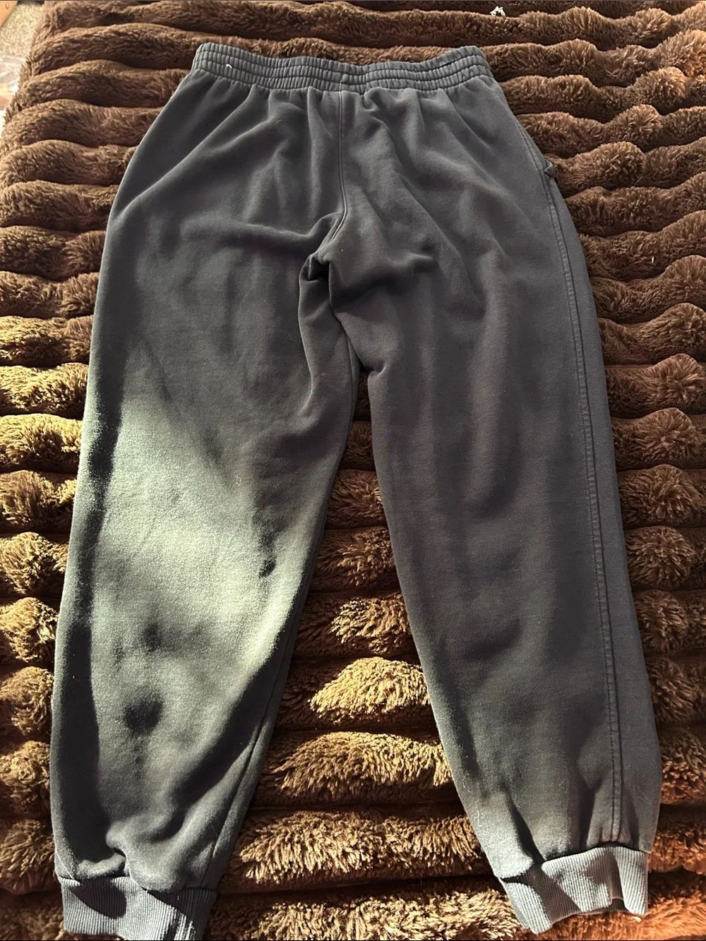 Nike Kids Black Sweatpants with White Swoosh